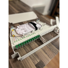 Tiroir optique pivotant équipé de 12 traversées et 12 pigtails SCAPC G657  Tiroirs optiques équipés 87,00 €Tiroirs optiques é...